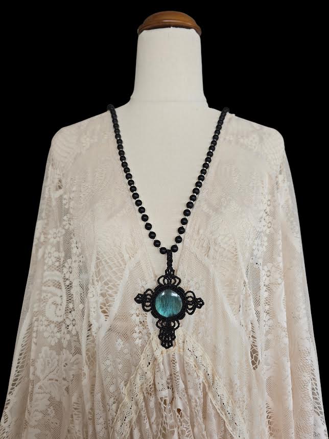 Gold Wing Cross Pendant with Round Stone Named by Poet